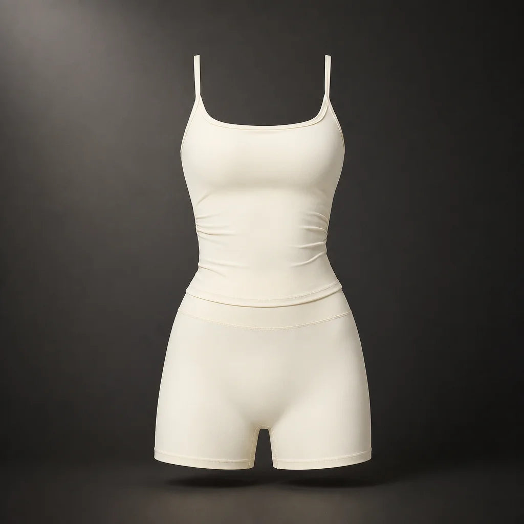 Clean isolated fashion product photograph, 1:1. The exact referenced cream sleeveless sports bra and